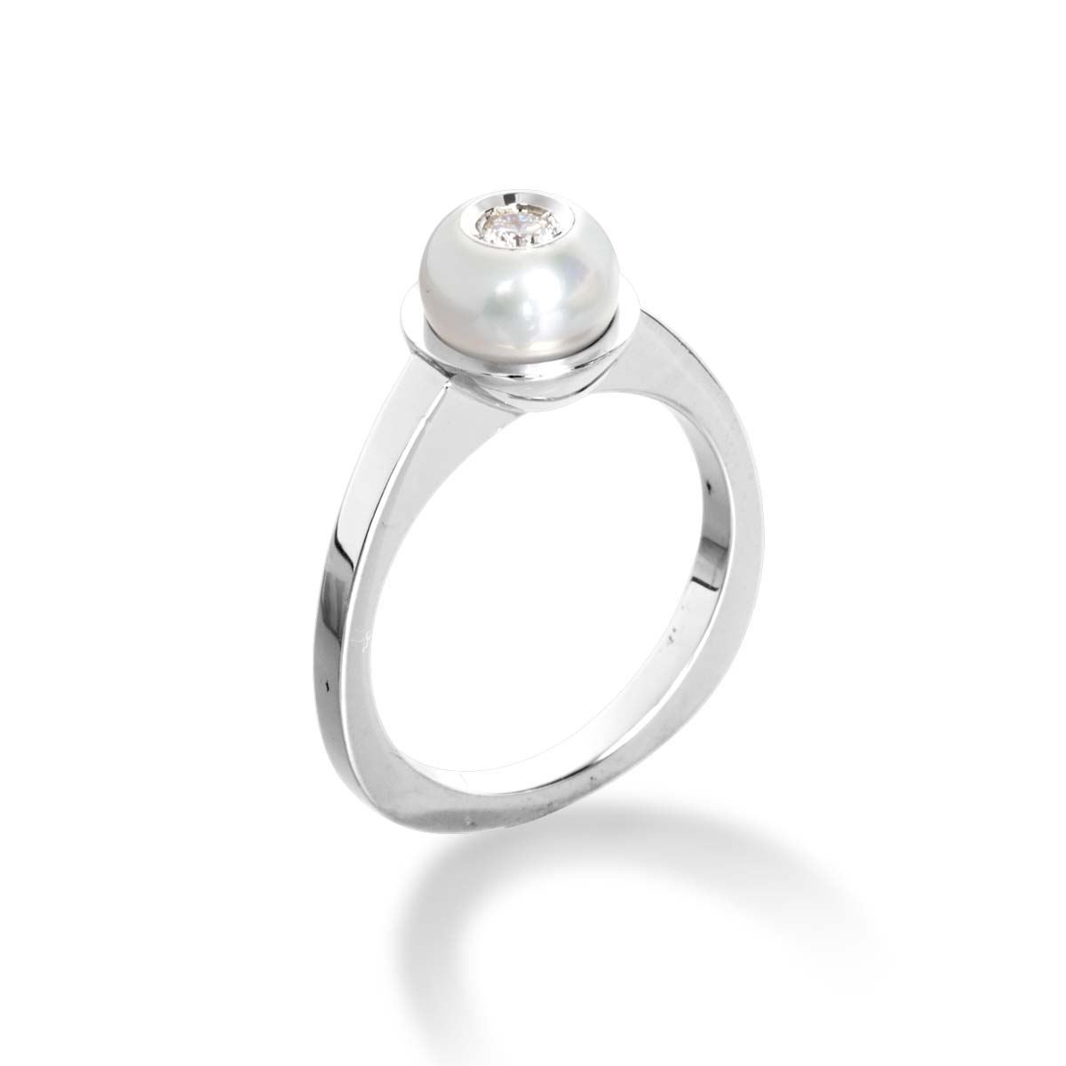 Diamond in a Pearl Ring
